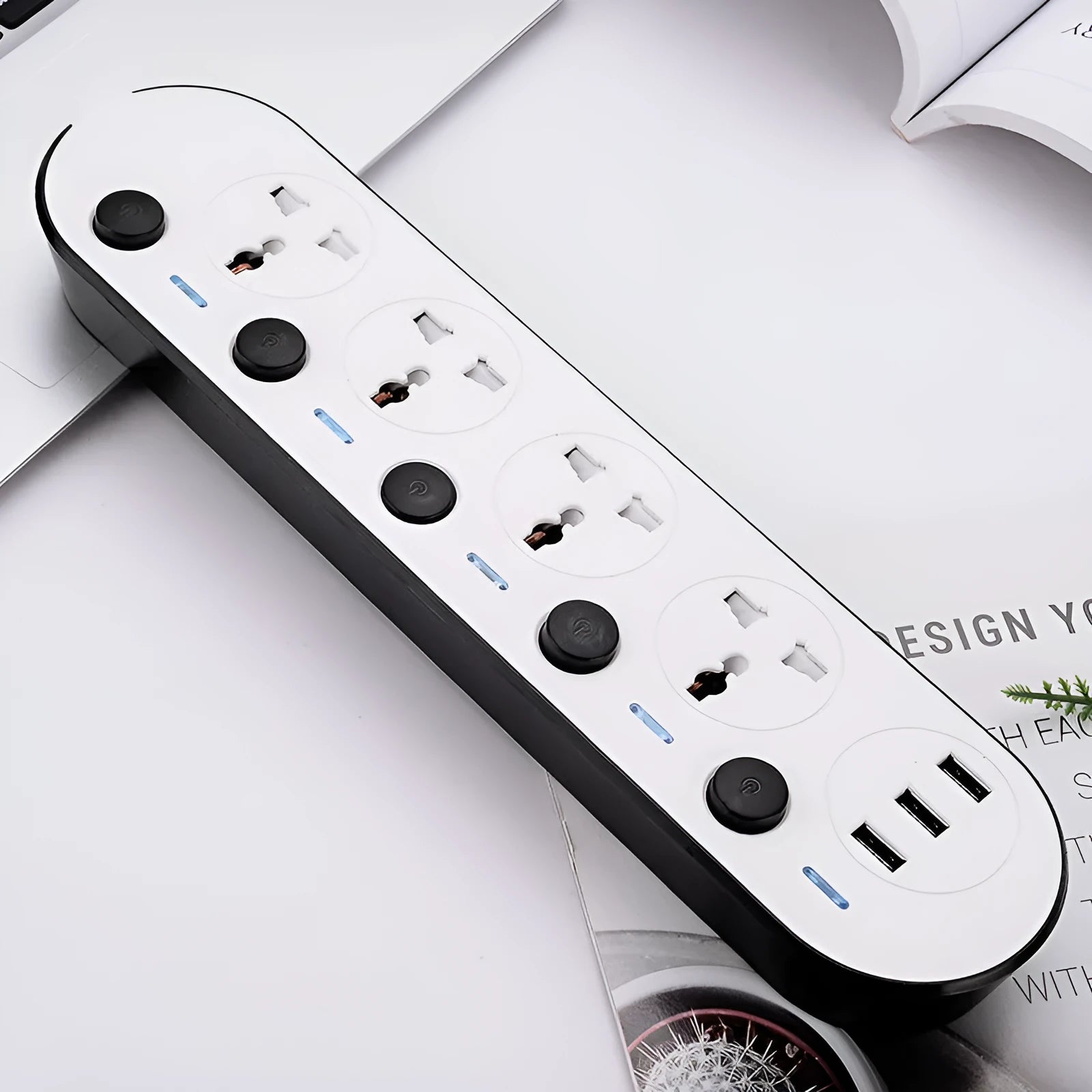 Multi-switch USB power strip compatible with international plugs on a desk.