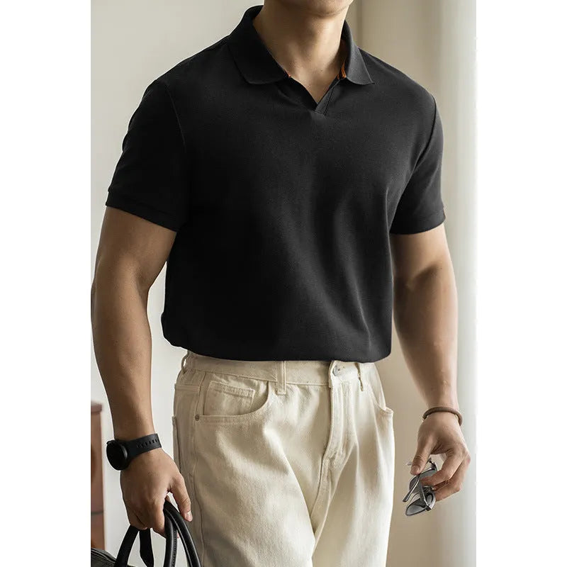 American-style light blue cotton blend short-sleeve polo shirt laid flat, showing regular fit and button placket.