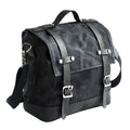 Black waterproof canvas motorcycle side pannier bag with cowhide reinforcement mounted on motorcycle
