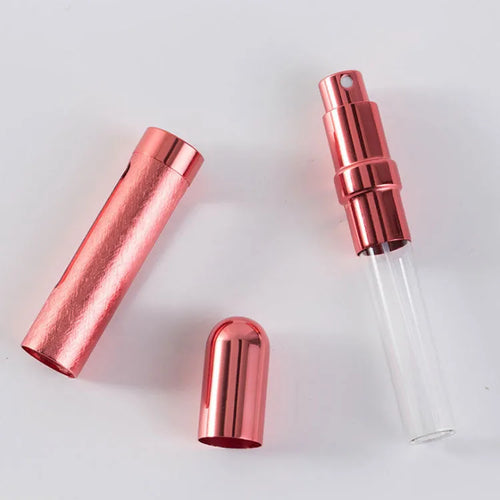 Slim 12ml aluminium bullet-style travel perfume atomiser bottle in a choice of metallic colours.