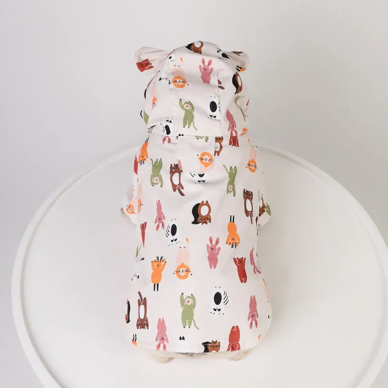 Beige cartoon dog raincoat with animal design showing front leg sleeves and back coverage