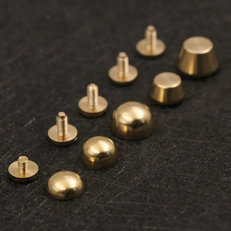 Brass decorative foot nail buckle in round and geometric designs, sizes 10x6mm and 12x7mm.