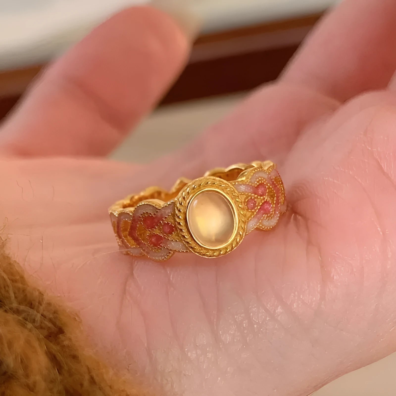 Pink crystal enamel geometric open ring on gold-plated copper band with adjustable cuff design