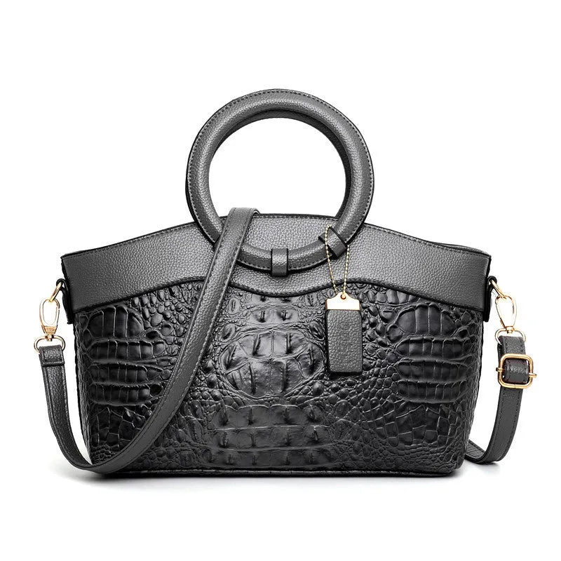 Women's casual fabric handbag in multiple colours showing front zipper and shoulder strap
