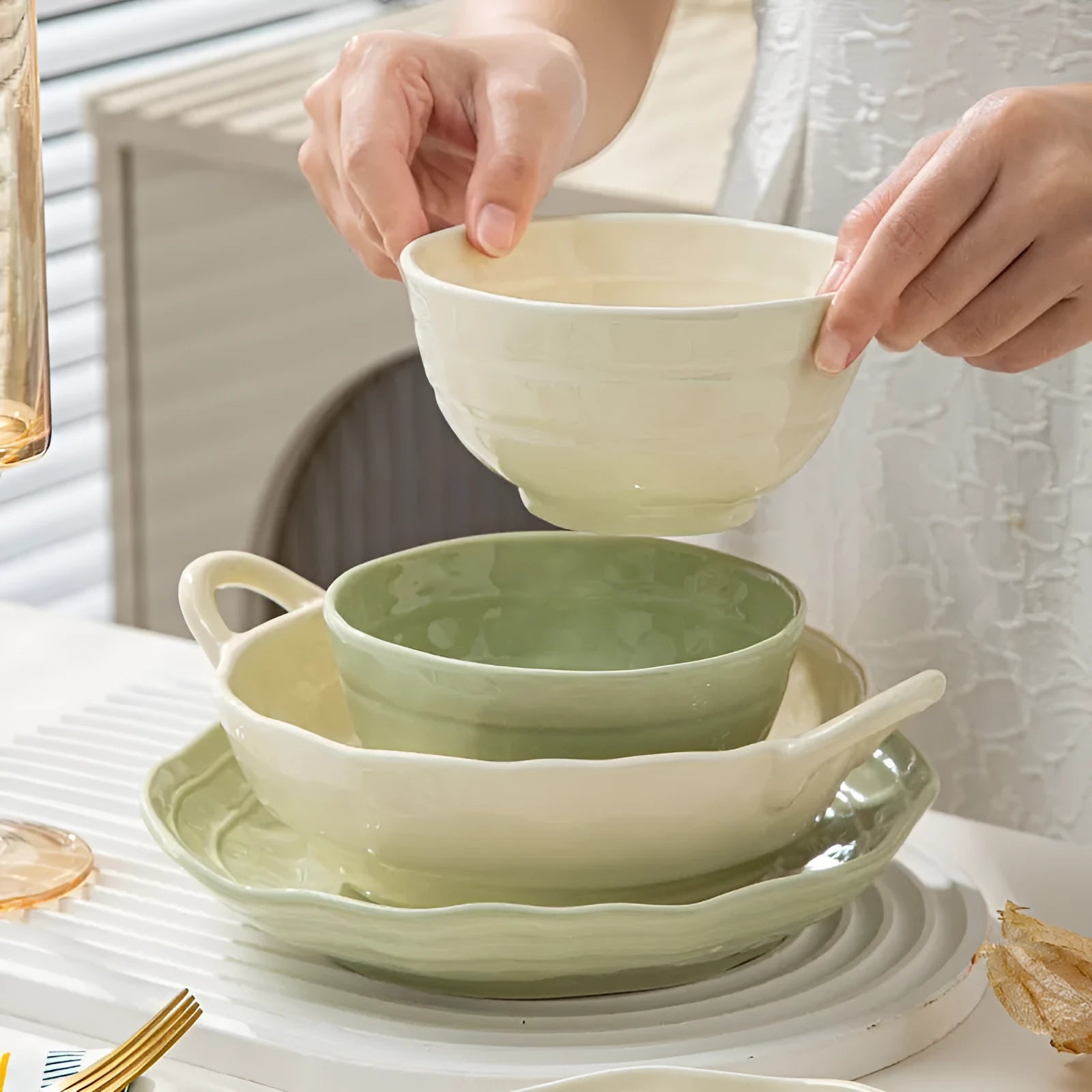 Solid colour ceramic tableware set with seven pieces showing modern simple design