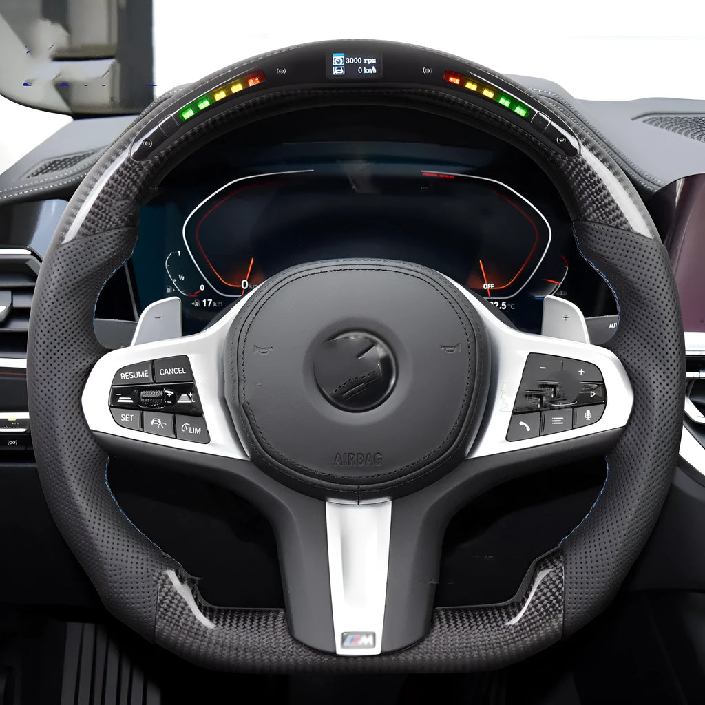 Black carbon fibre sports steering wheel with LED display for BMW X3 and X5 cars.