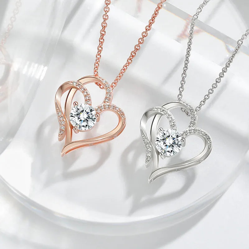 Close-up of a 925 silver heart-shaped pendant necklace on a chain.