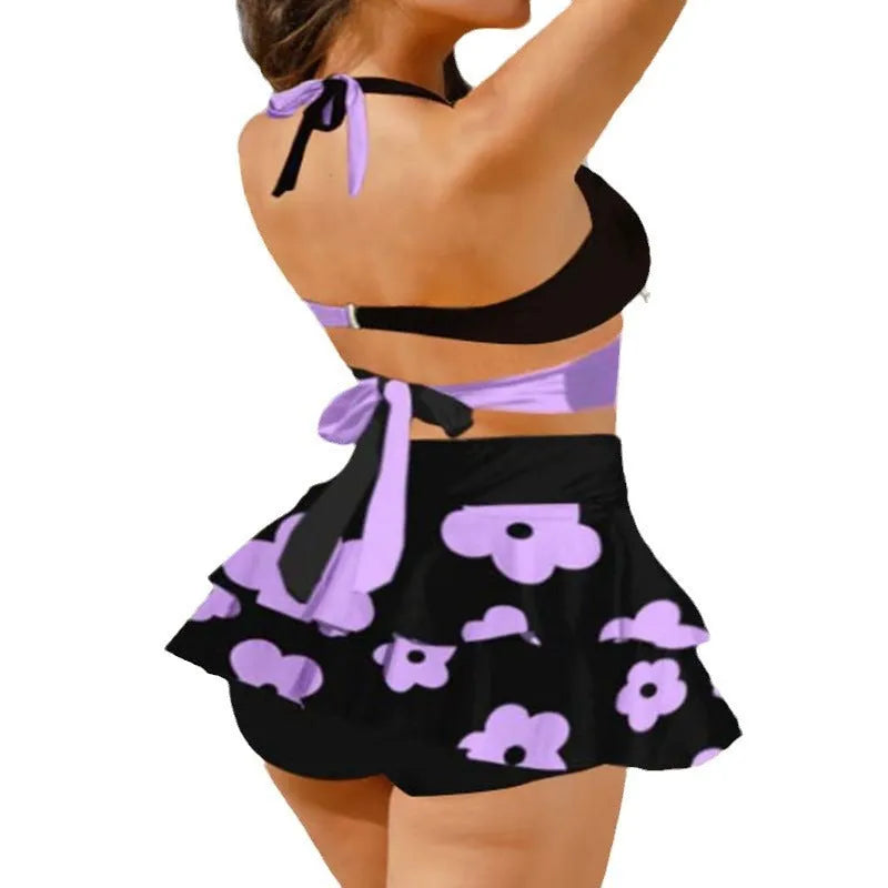 Purple high-waist women's bikini with lace-up top and matching split skirt