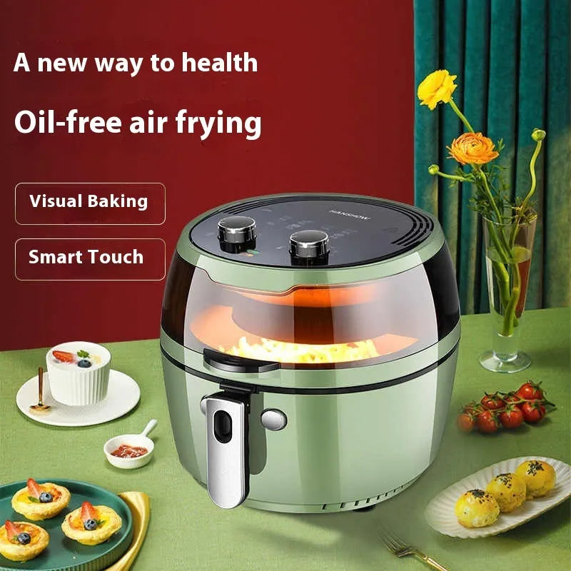 Air fryer oven with visible cooking window and mechanical button controls showing 8L capacity