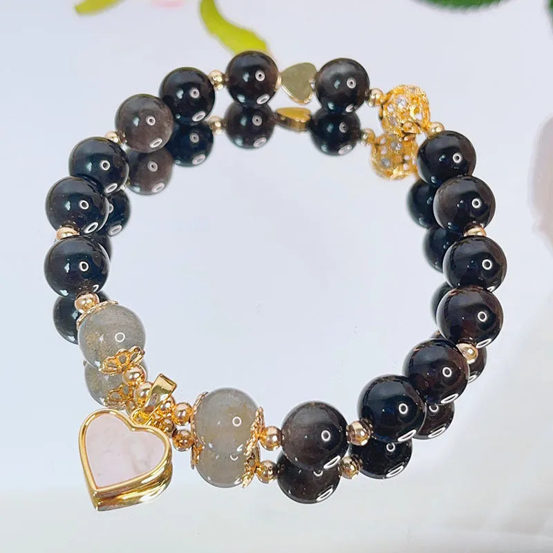 Silverstone electroplated women's bracelet with adjustable clasp and choice of floral, heart, or star charm designs