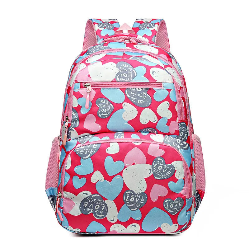 Blue children's Oxford cloth school backpack with large main compartment and padded air-pillow shoulder straps.