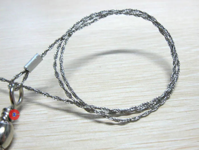 Stainless steel survival wire saw with thumb rings for outdoor cutting