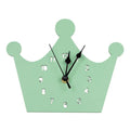 Wooden cartoon wall clock showing a pink crown design, dimensions 22x18cm.