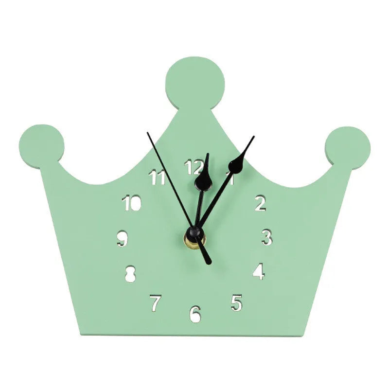 Wooden cartoon wall clock showing a pink crown design, dimensions 22x18cm.