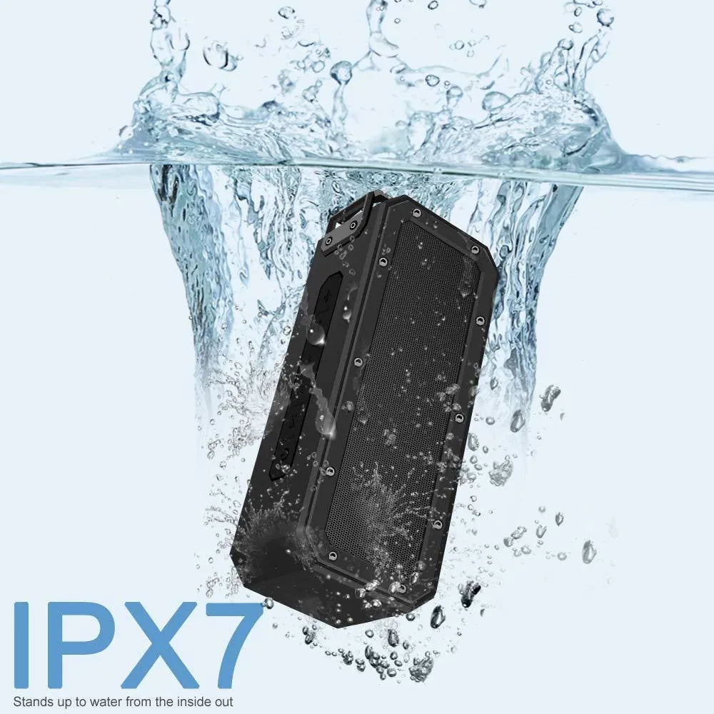 Black X3 PRO portable Bluetooth speaker with carrying rope, showing size relative to a hand.
