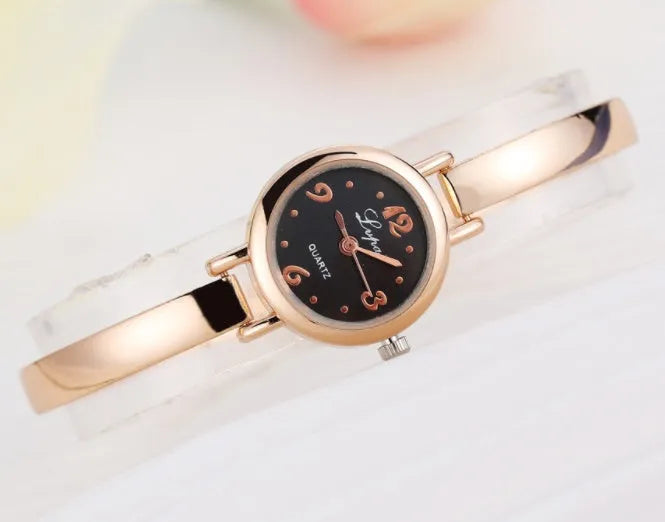 Women bracelet quartz wristwatch round dial silicone strap alloy case pin buckle silver rose gold