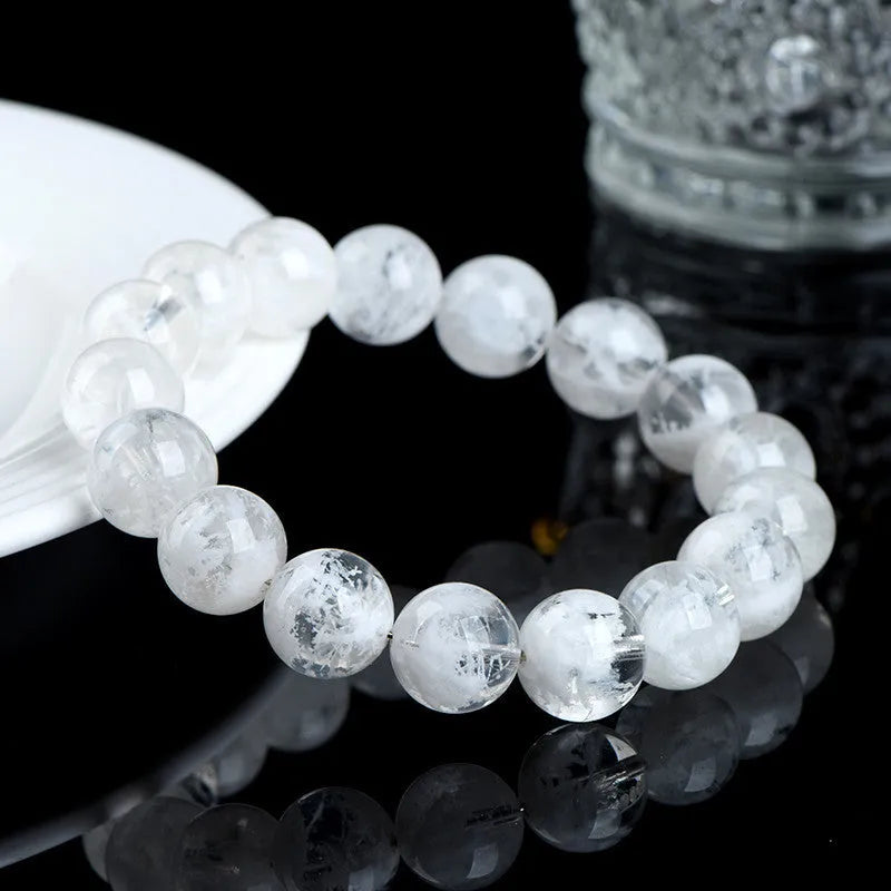 Women's crystal bracelet with natural blizzard snowflake round beads and geometric Ruyi Xiangyun design