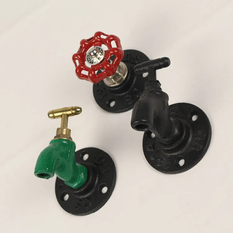 Modern minimalist metal wall hook in a water pipe style, shown in black, green, and red colour options.
