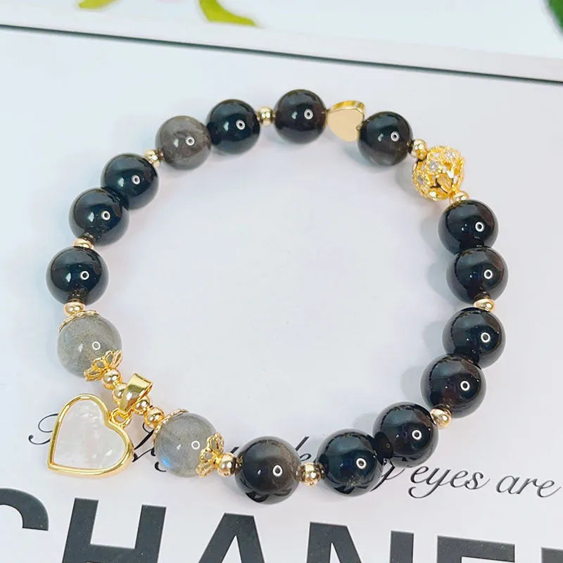 Silverstone electroplated women's bracelet with adjustable clasp and choice of floral, heart, or star charm designs
