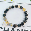 Silverstone electroplated women's bracelet with adjustable clasp and choice of floral, heart, or star charm designs