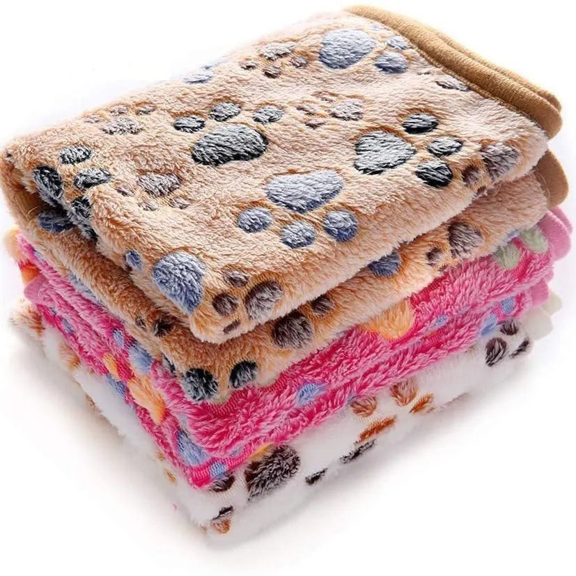 Coral fleece pet blanket with paw print design in beige colour laid flat showing size