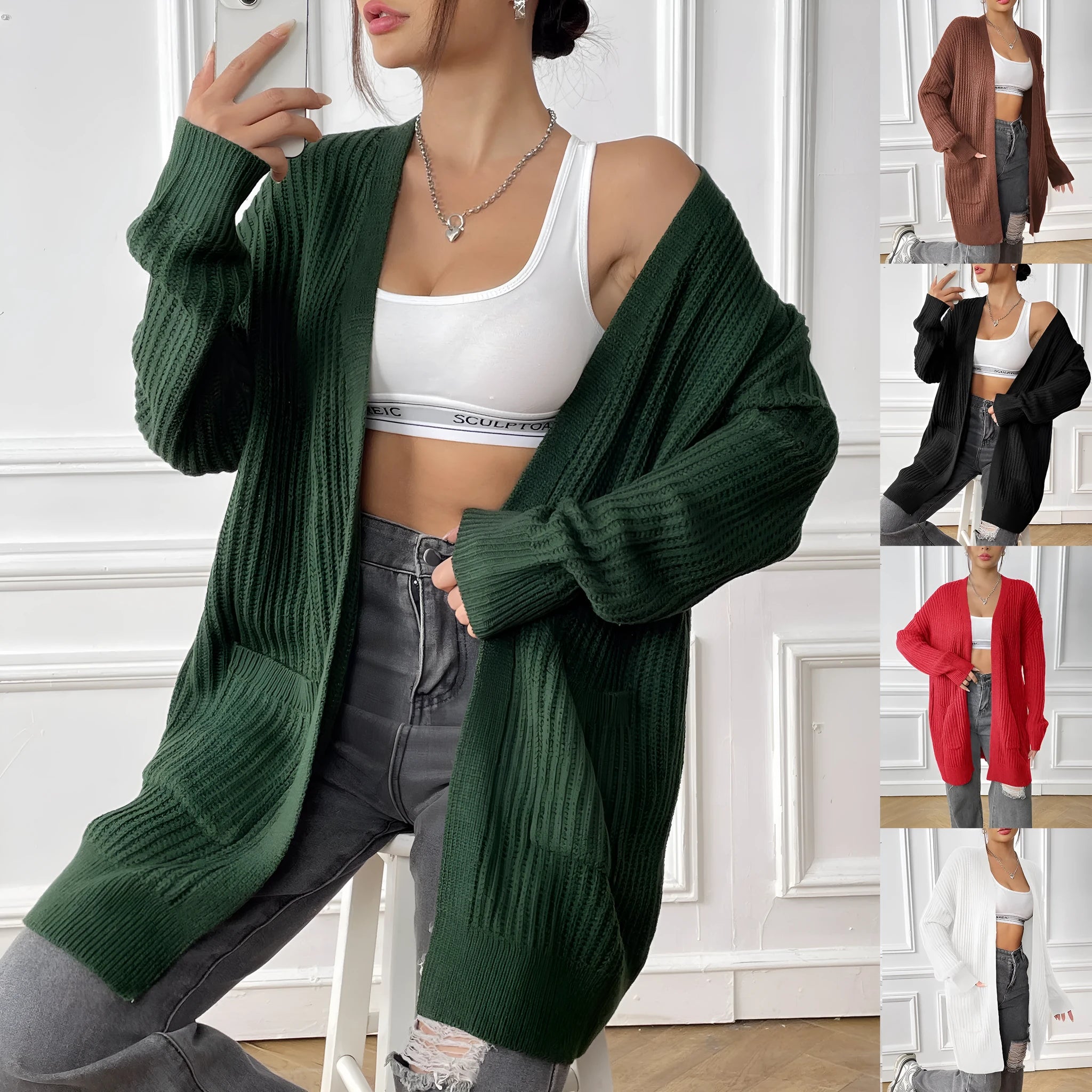 Women's mid-length loose-fit acrylic cardigan in dark green, shown as a single piece with long sleeves.