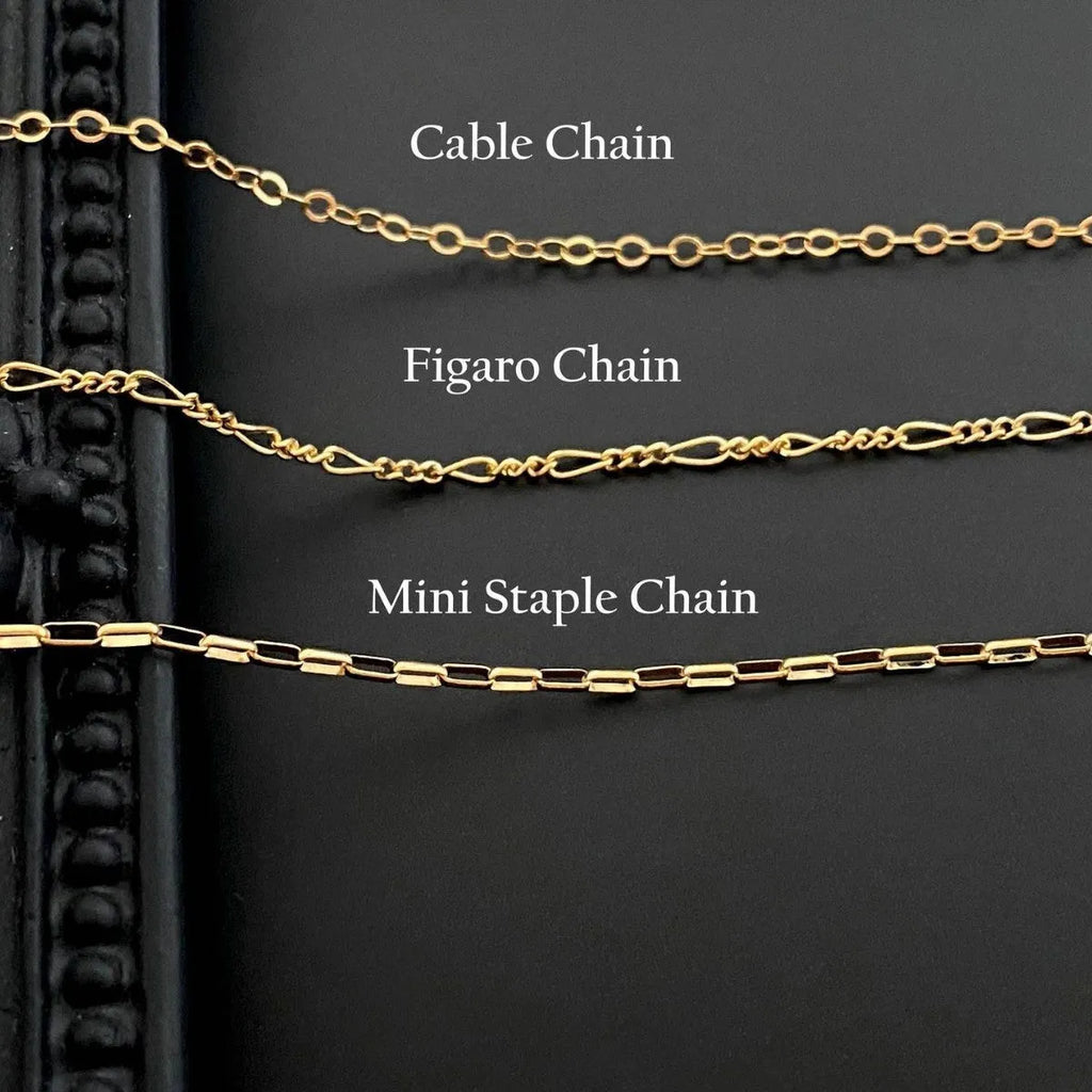 Ghost pendant necklace on twisted stainless steel chain with titanium steel detail
