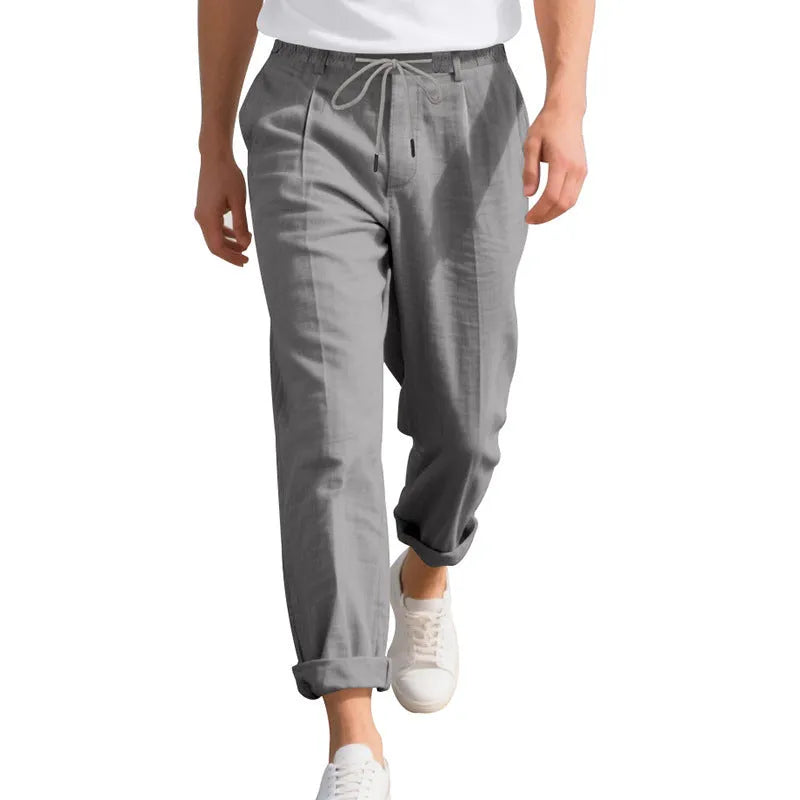 Men's casual linen trousers in loose straight-leg style with drawstring waist