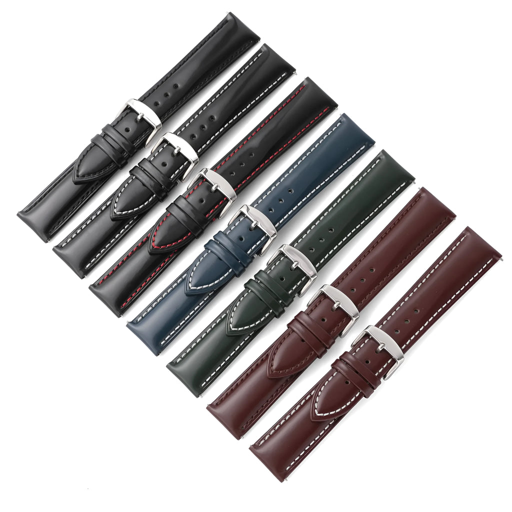 Quick release cowhide leather watch strap shown in black and dark brown colours with visible spring bar mechanism.