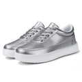 Women's white leather lace-up casual flat shoes on a plain background