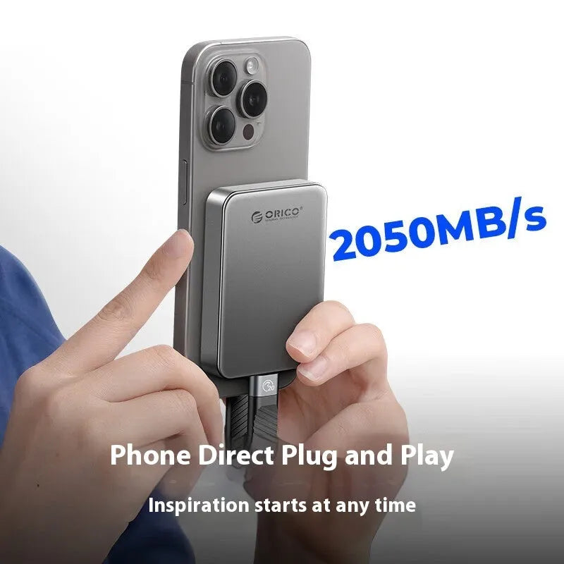 Grey magnetic mobile solid-state drive with suction ring attachment and ultra-thin design