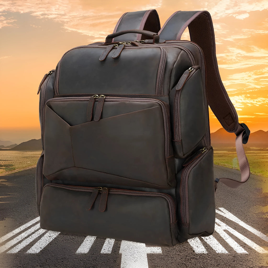 Dark brown retro leather backpack for men showing front view and open compartments.