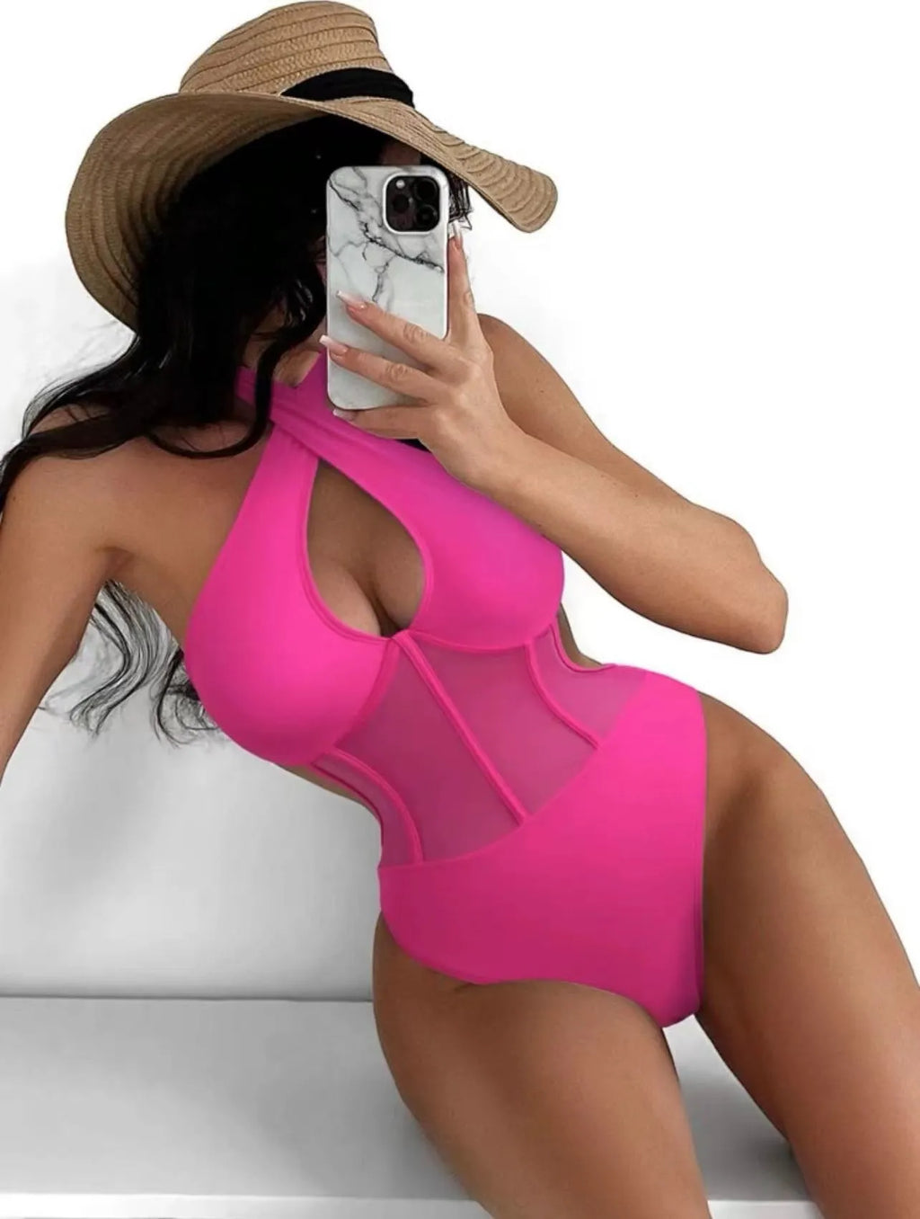 Women's black one-piece bikini swimsuit with nylon-spandex fabric on mannequin