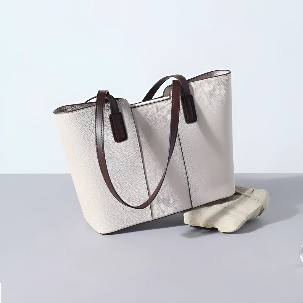 Women's genuine leather shoulder bag in box-type shape, shown in a choice of colours including khaki and black.