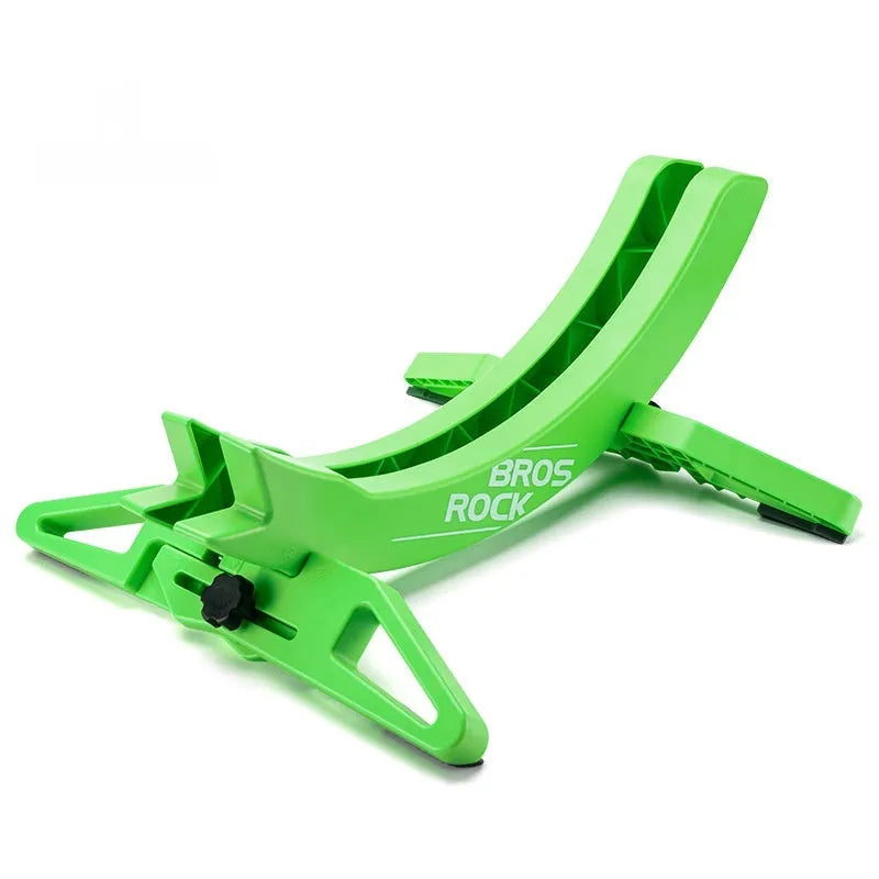 Black and green ABS plastic bicycle parking rack holder with fixed mounting bracket.