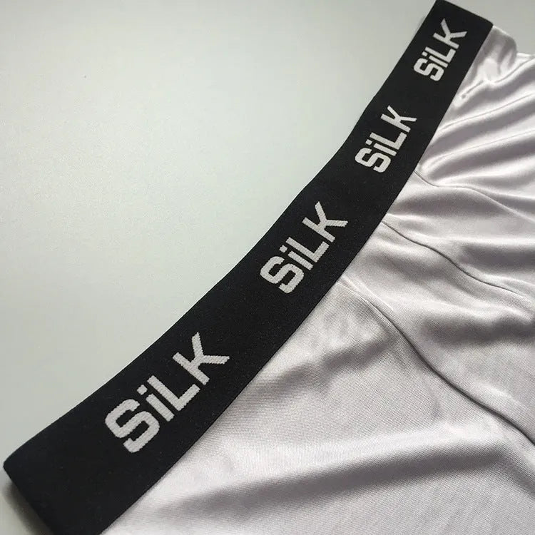 Men's loose-fit silk shorts in navy blue, silver grey, or skin colour