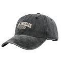 Retro personalised adjustable peaked cap showing distressed letters embroidery on conical crown