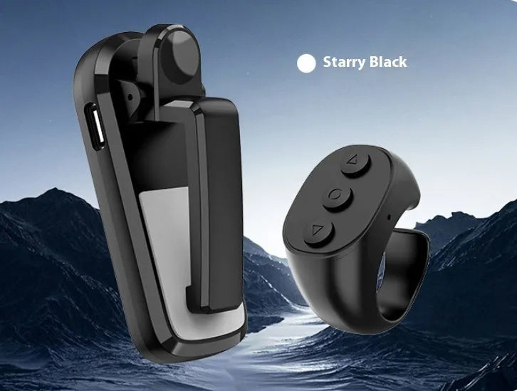 Wireless page turner remote control and foot clicker for tablets on a wooden table.