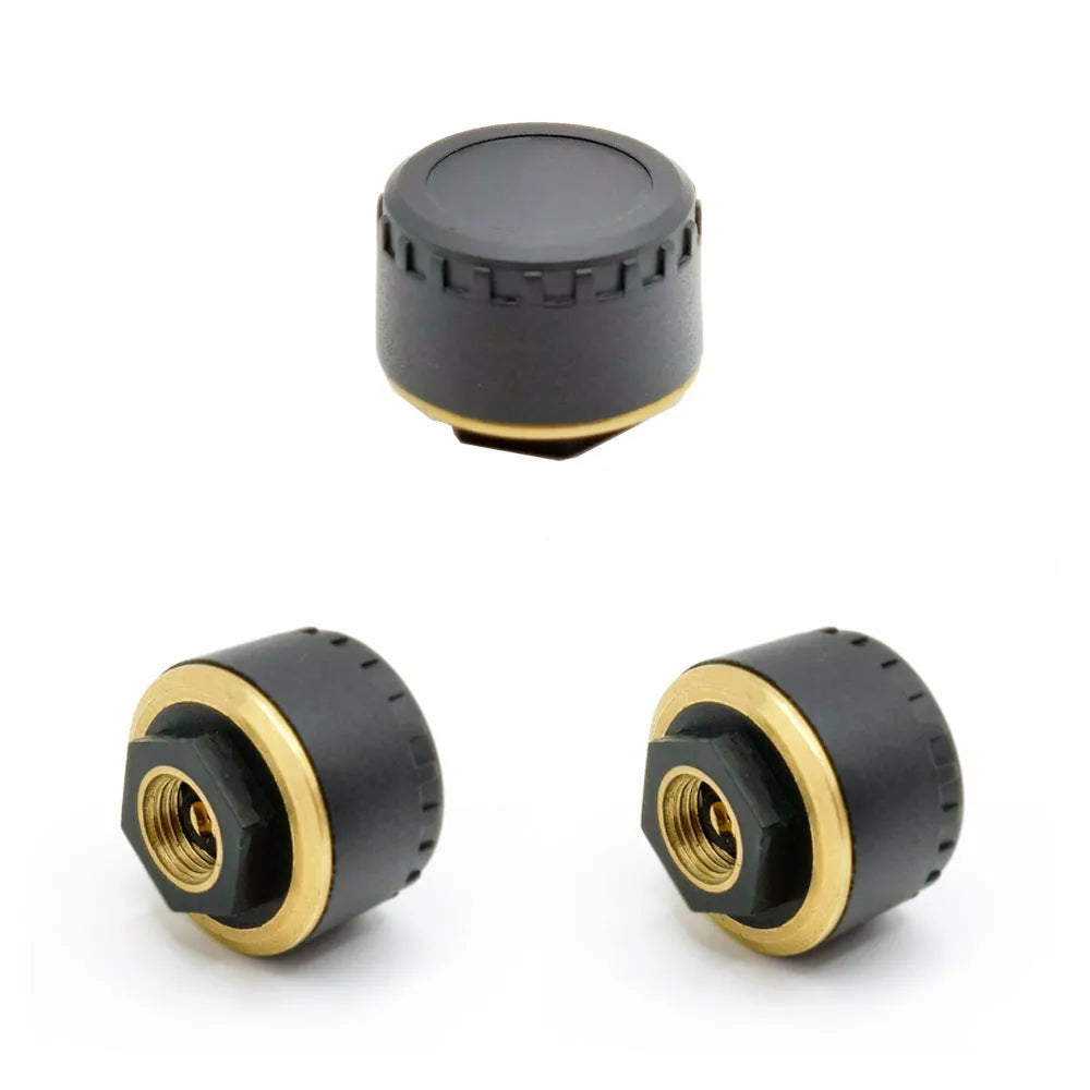 Four black Bluetooth tyre pressure sensors for mobile phone monitoring display