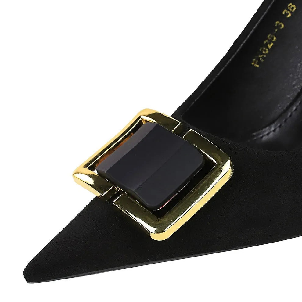 Black suede women's court shoes with a 9cm stiletto heel and pointed toe on a white background