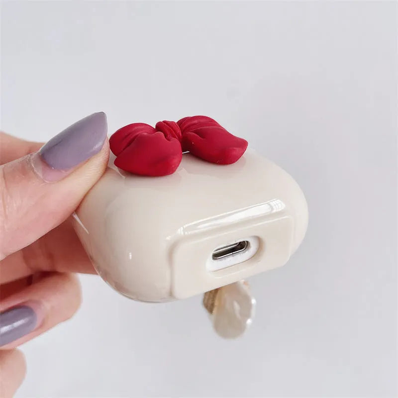 Beige red bow shell wireless earphone case for AirPods models with TPU clamshell design