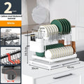 White double-layer kitchen draining rack with removable storage compartments above sink