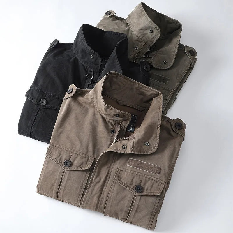 Men's loose fit cotton twill jacket in light army green, shown with zip-up front.