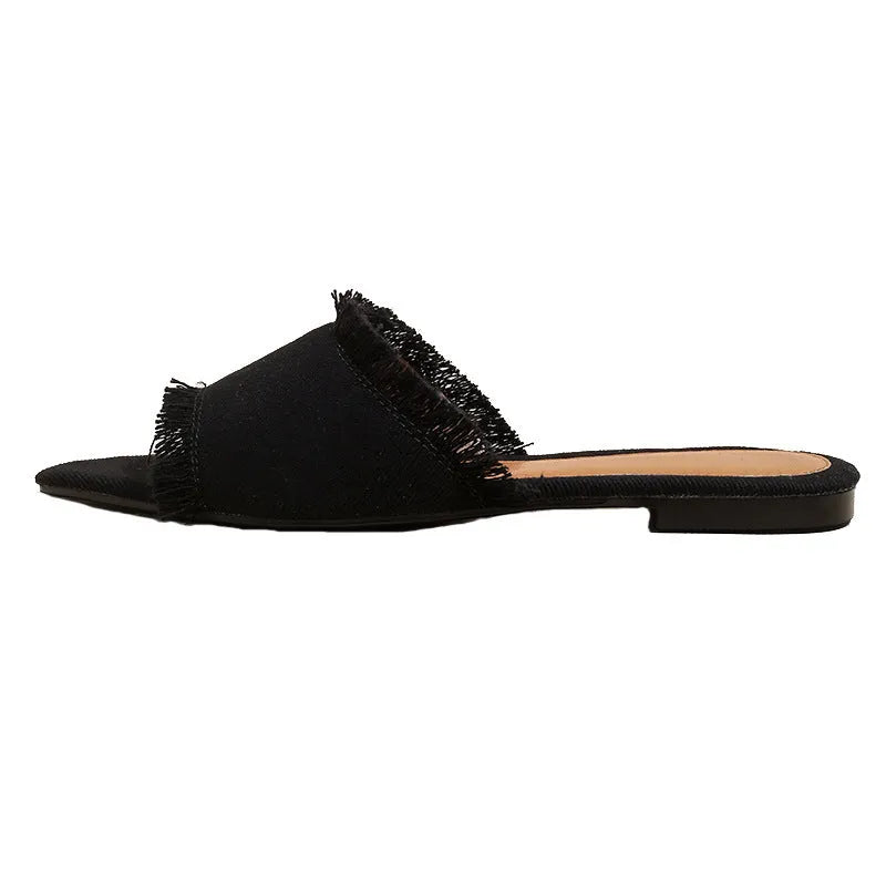 Women's denim flat slippers with tassel detail and leather lining in apricot colour