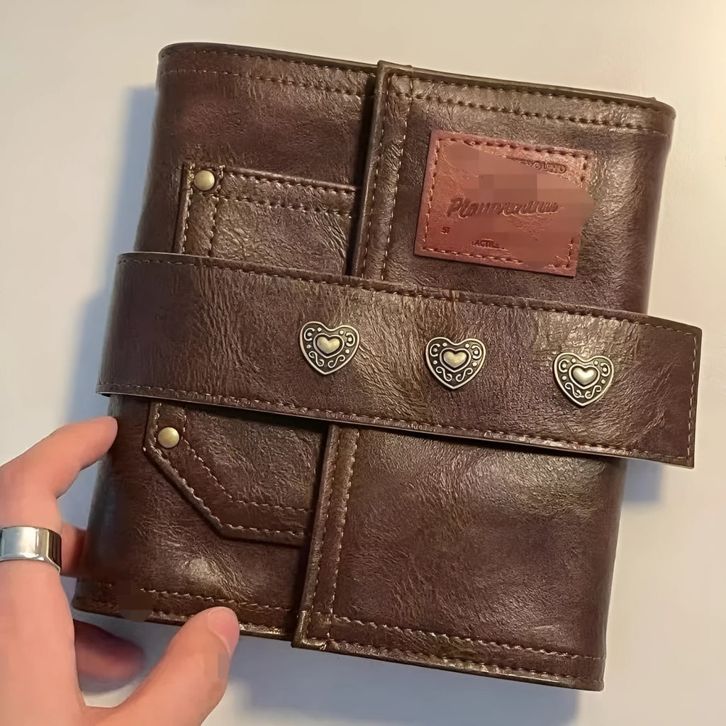A7 brown PU leather notebook with buckle closure and loose-leaf binder binding