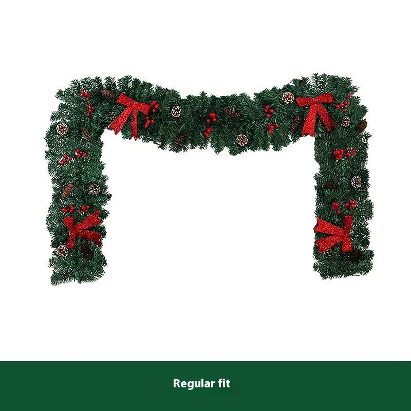 European-style rattan Christmas cane decoration with pine cone and red bow, approximately one metre tall.