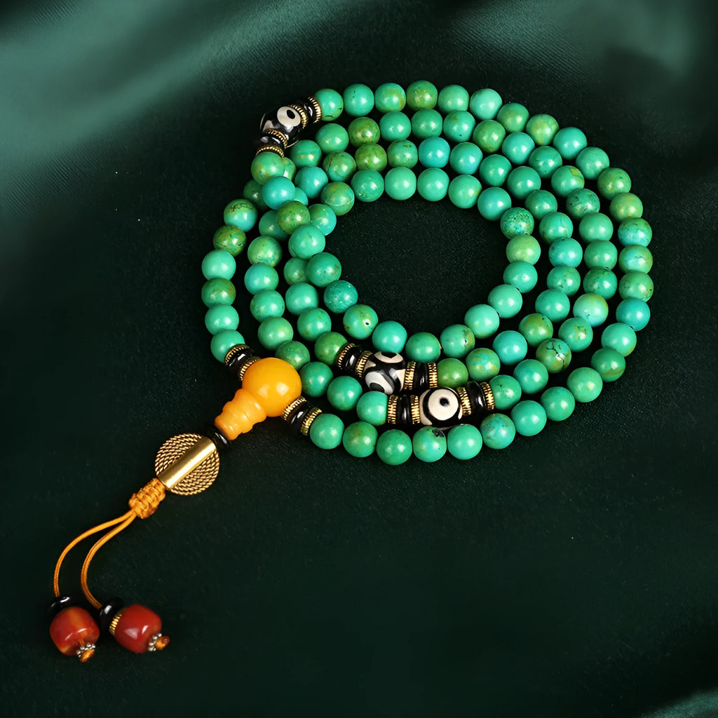 Natural turquoise bracelet with 108 polished 8mm round beads showing raw ore texture