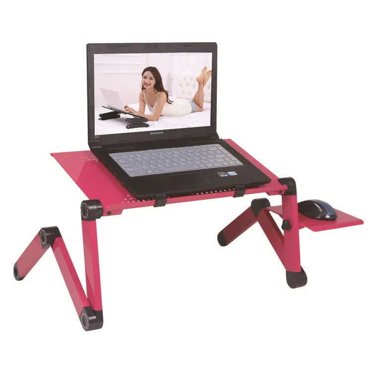 Black folding metal laptop bed desk with cooling fans, shown extended on a bed.