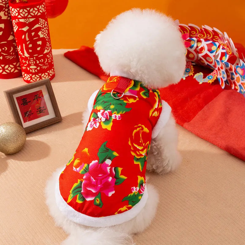 Red winter dog vest with plush lining, metal D-ring, and large floral peony pattern on a small dog