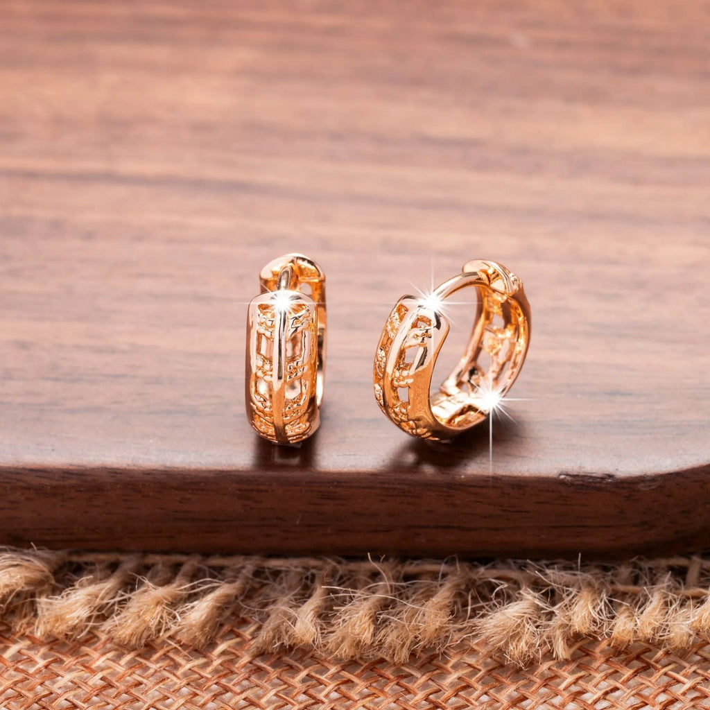 Copper heart and leaf shaped hollowed out earrings with rose gold plating